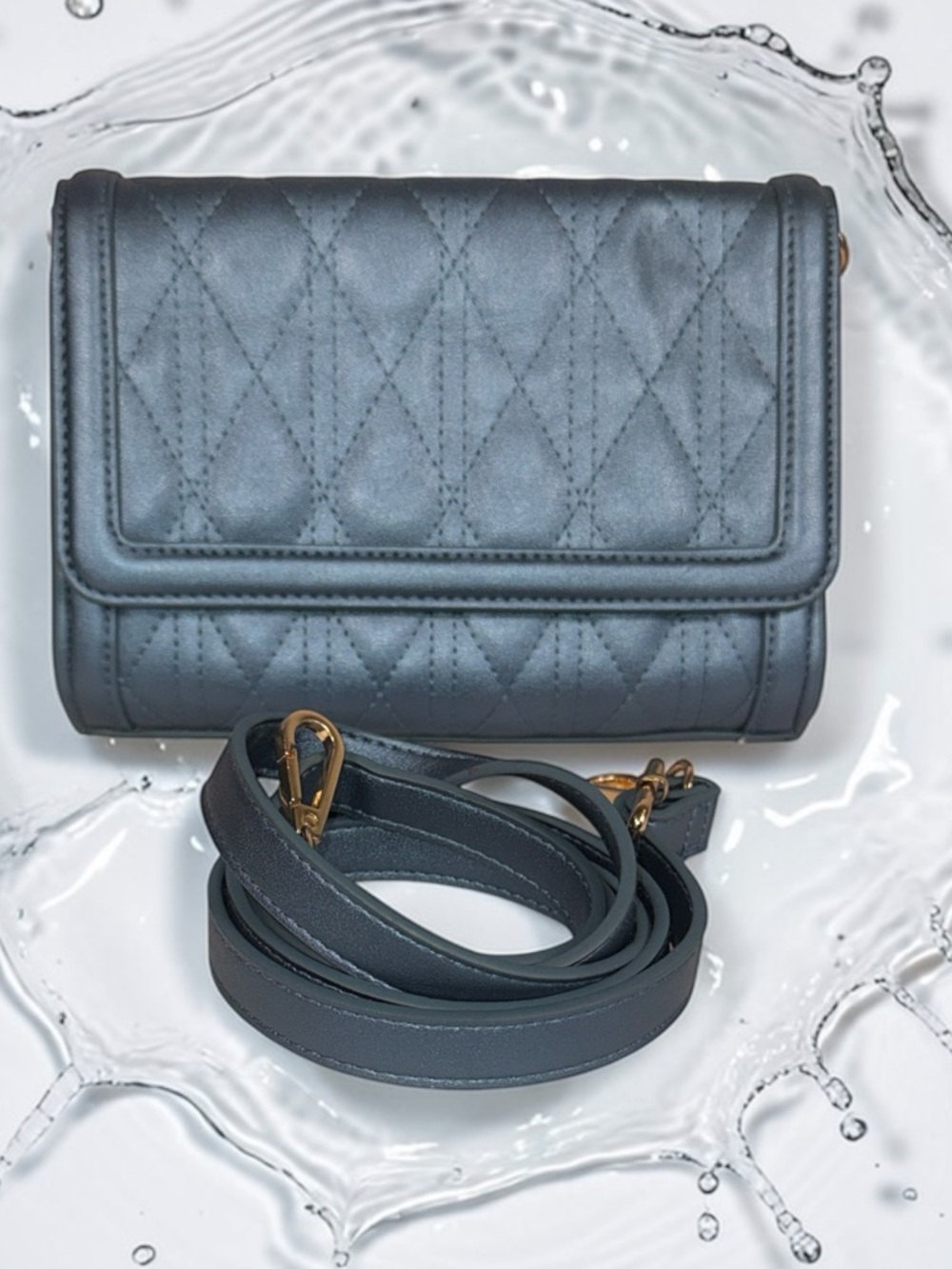 Save the Girls blue quilted handbag